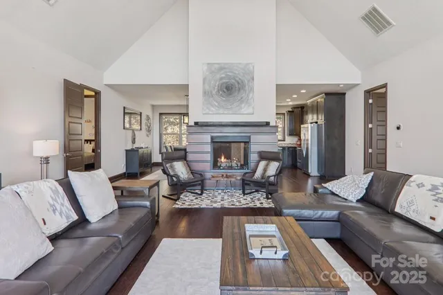 a living room with furniture fireplace and furniture