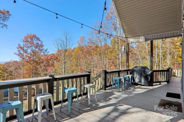 a view of a balcony with chairs