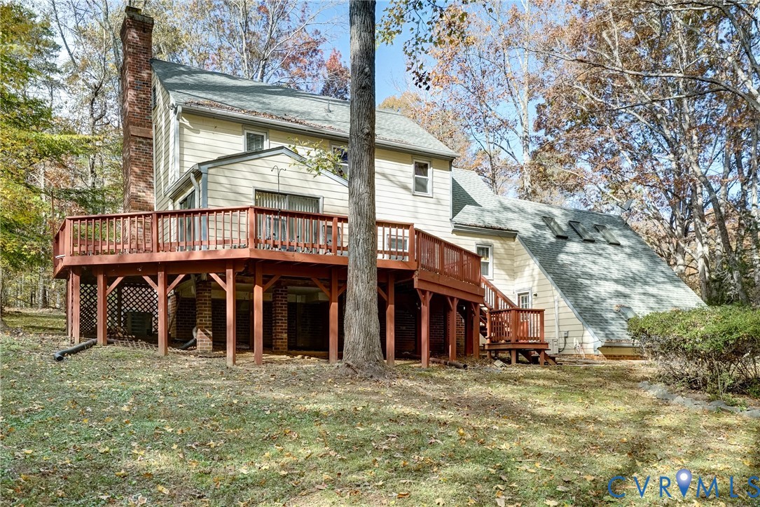 1253 Cardwell Road Crozier, VA 23039 - Photo 13 of 50 a view of a large building with a tree in front of it
