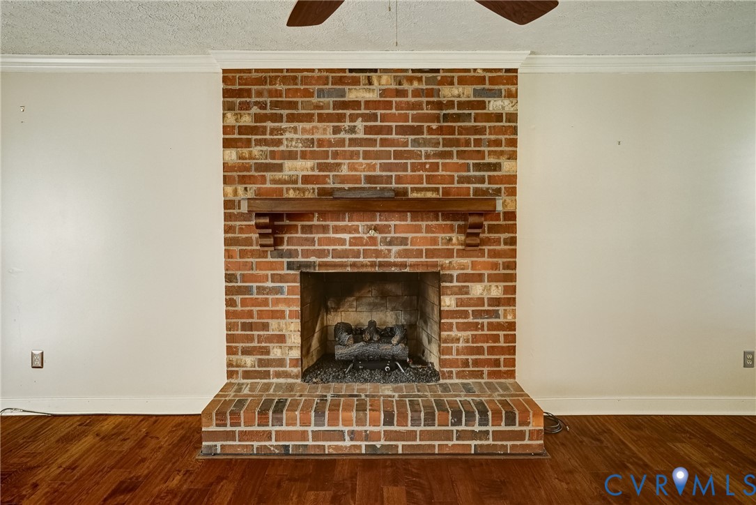 1253 Cardwell Road Crozier, VA 23039 - Photo 17 of 50 a view of fireplace with wooden floor
