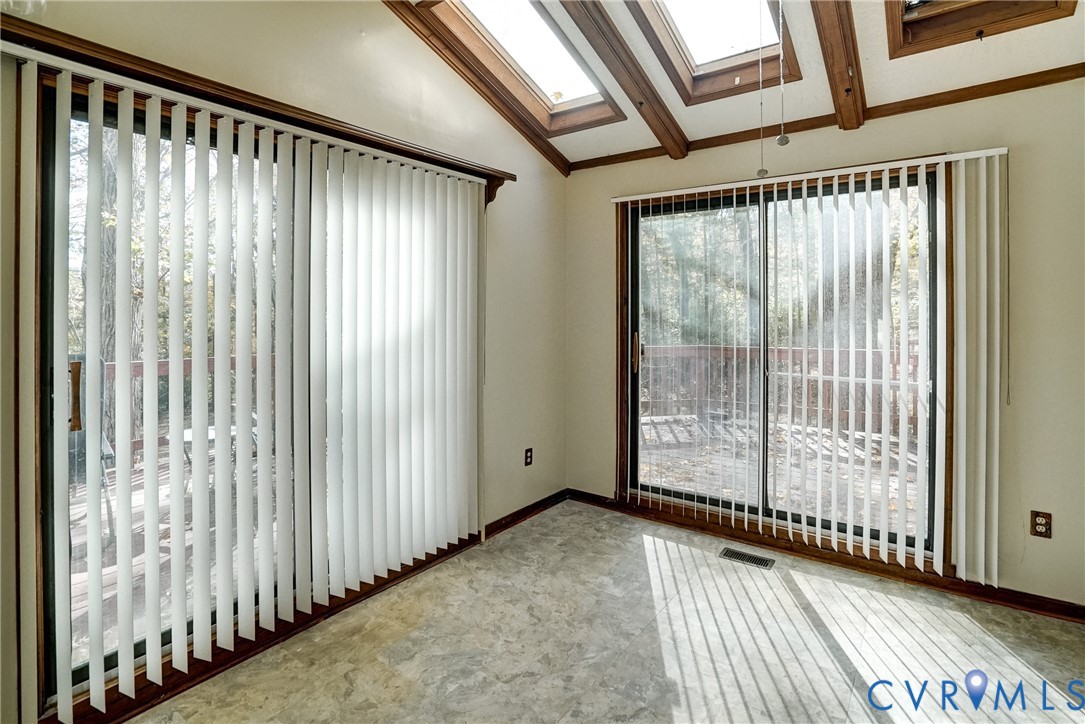 1253 Cardwell Road Crozier, VA 23039 - Photo 22 of 50 a view of a porch with wooden floor and a window