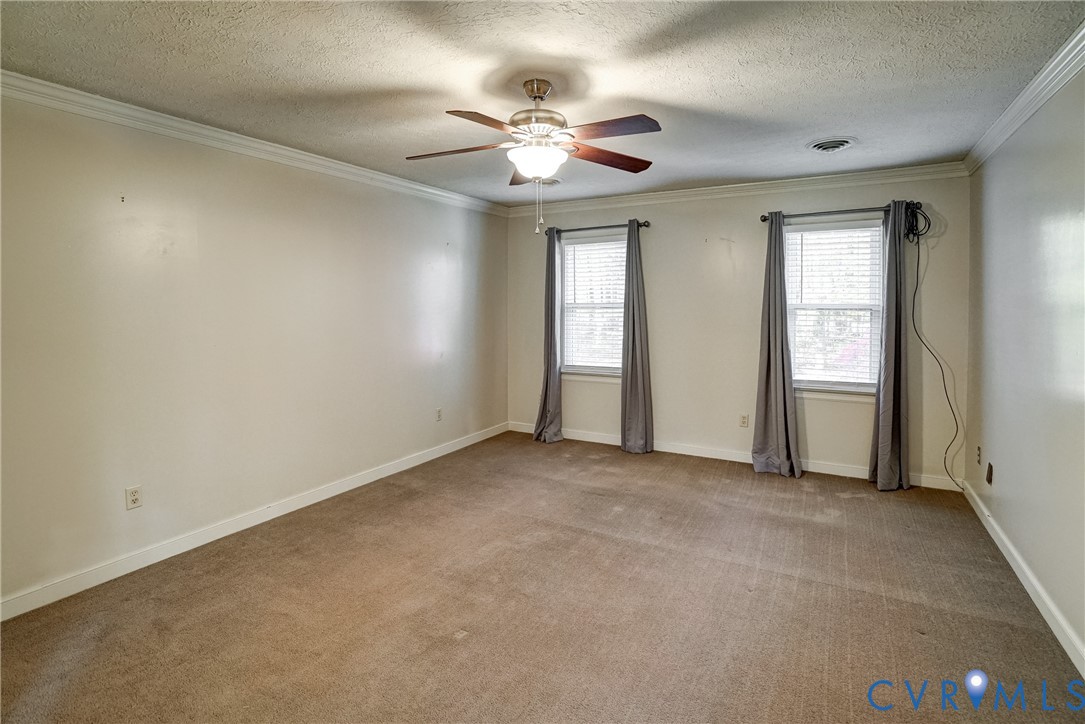 1253 Cardwell Road Crozier, VA 23039 - Photo 45 of 50 an empty room with closet and windows