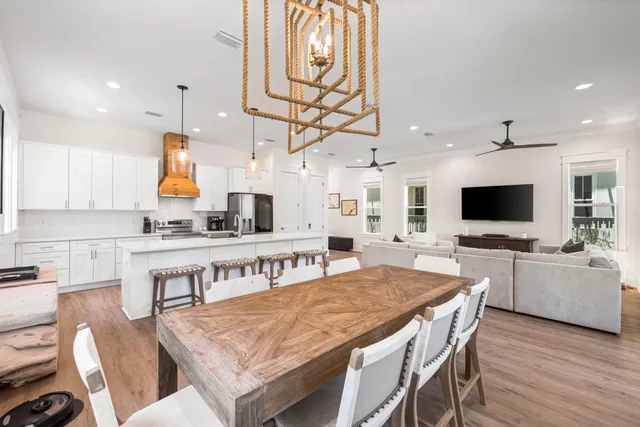 a bathroom with a sink mirror and toilet