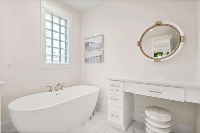 a view of storage and utility room with washer and dryer