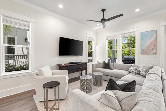 a large kitchen with a table and chairs in it