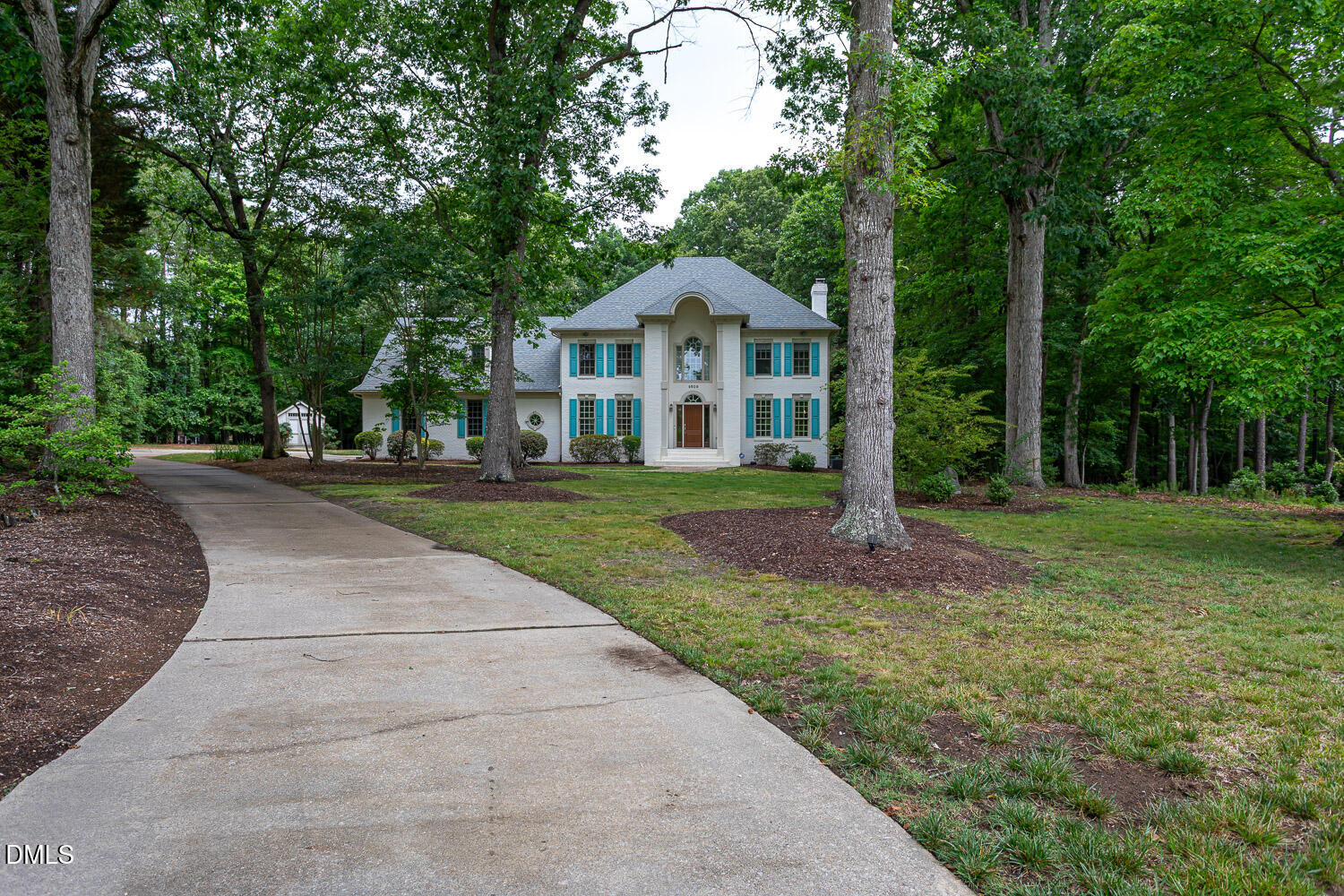 8509 Towneley Place Raleigh, NC 27615 - Photo 36 of 36 a front view of a house with a yard