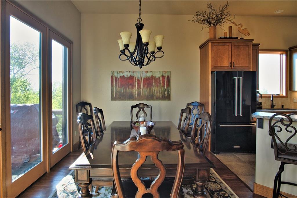 813 Sheep Ridge Road Fairplay, CO 80440 - Photo 8 of 35 a view of a dining room with furniture window and outside view
