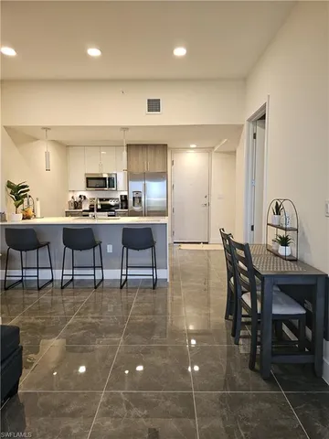 a view of a dining room with furniture