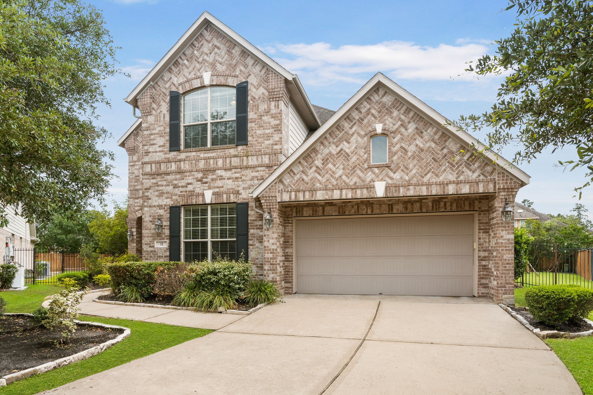 11 Pintuck Place Spring, TX 77389 - Photo 1 of 40 a view of a house with yard