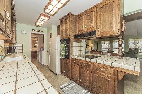 a spacious bedroom with a bed and a window