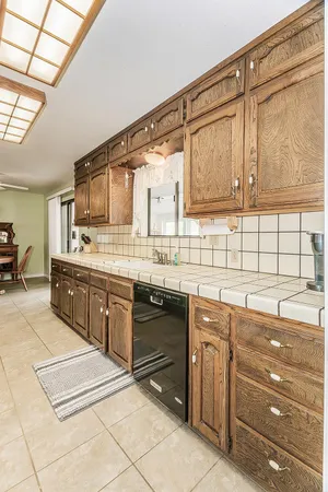 a bathroom with a sink a vanity and a mirror