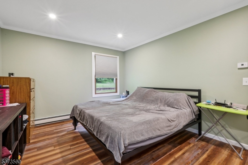 179 Mudtown Road Wantage, NJ 07461 - Photo 25 of 39 a bedroom with a bed and a window