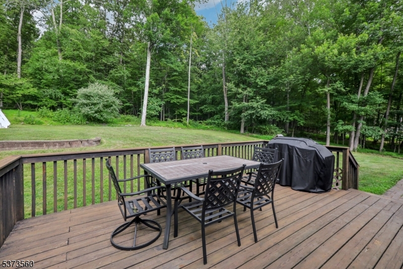 179 Mudtown Road Wantage, NJ 07461 - Photo 30 of 39 a view of a deck with furniture and wooden floor