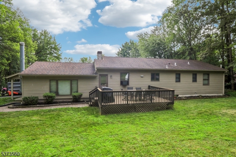 179 Mudtown Road Wantage, NJ 07461 - Photo 33 of 39 a front view of a house with a garden
