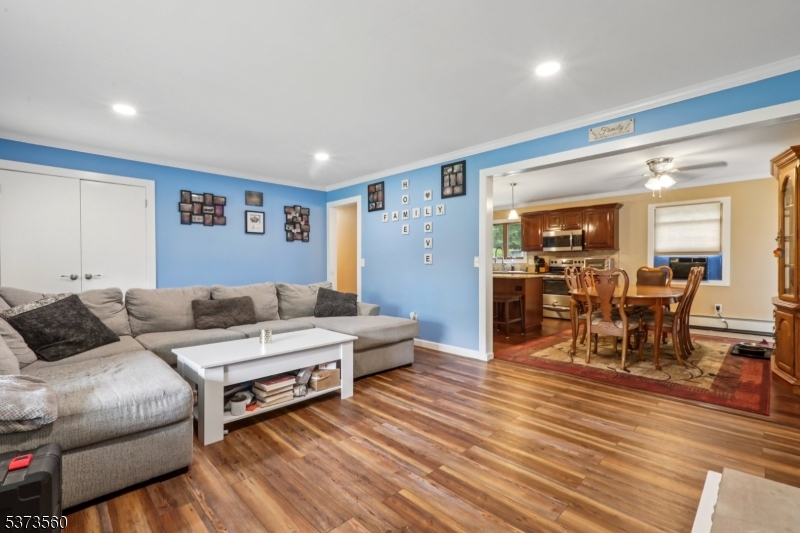 179 Mudtown Road Wantage, NJ 07461 - Photo 8 of 39 a living room with furniture and wooden floor