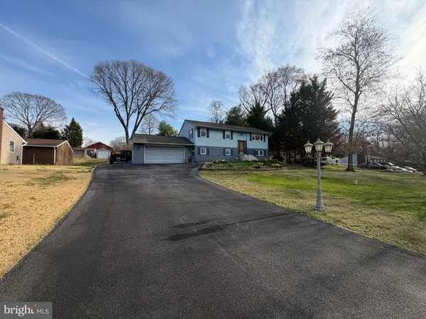 a view of a house with a big yard