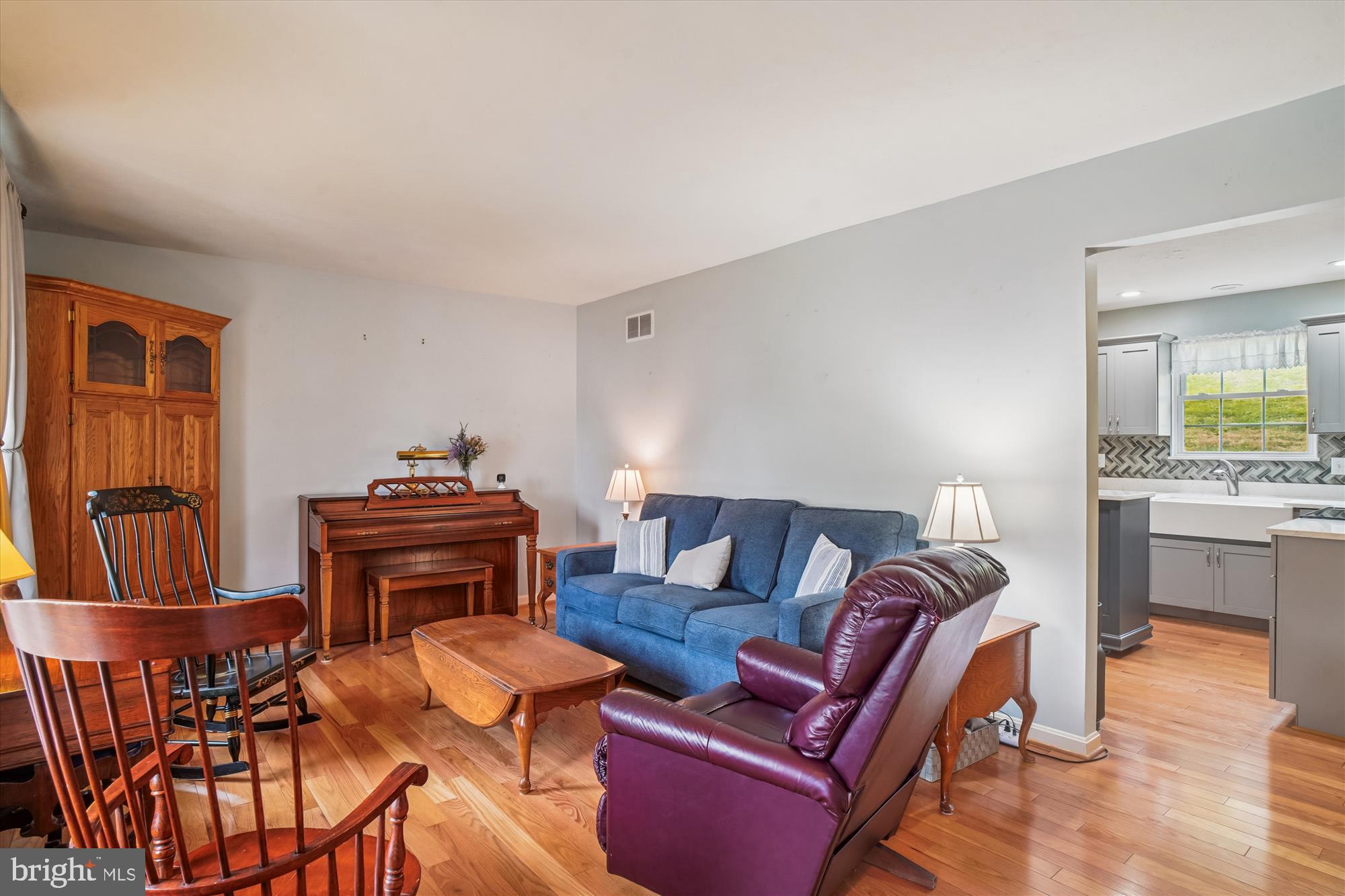 191 Marion Road Westminster, MD 21157 - Photo 11 of 38 a living room with furniture a piano and wooden floor