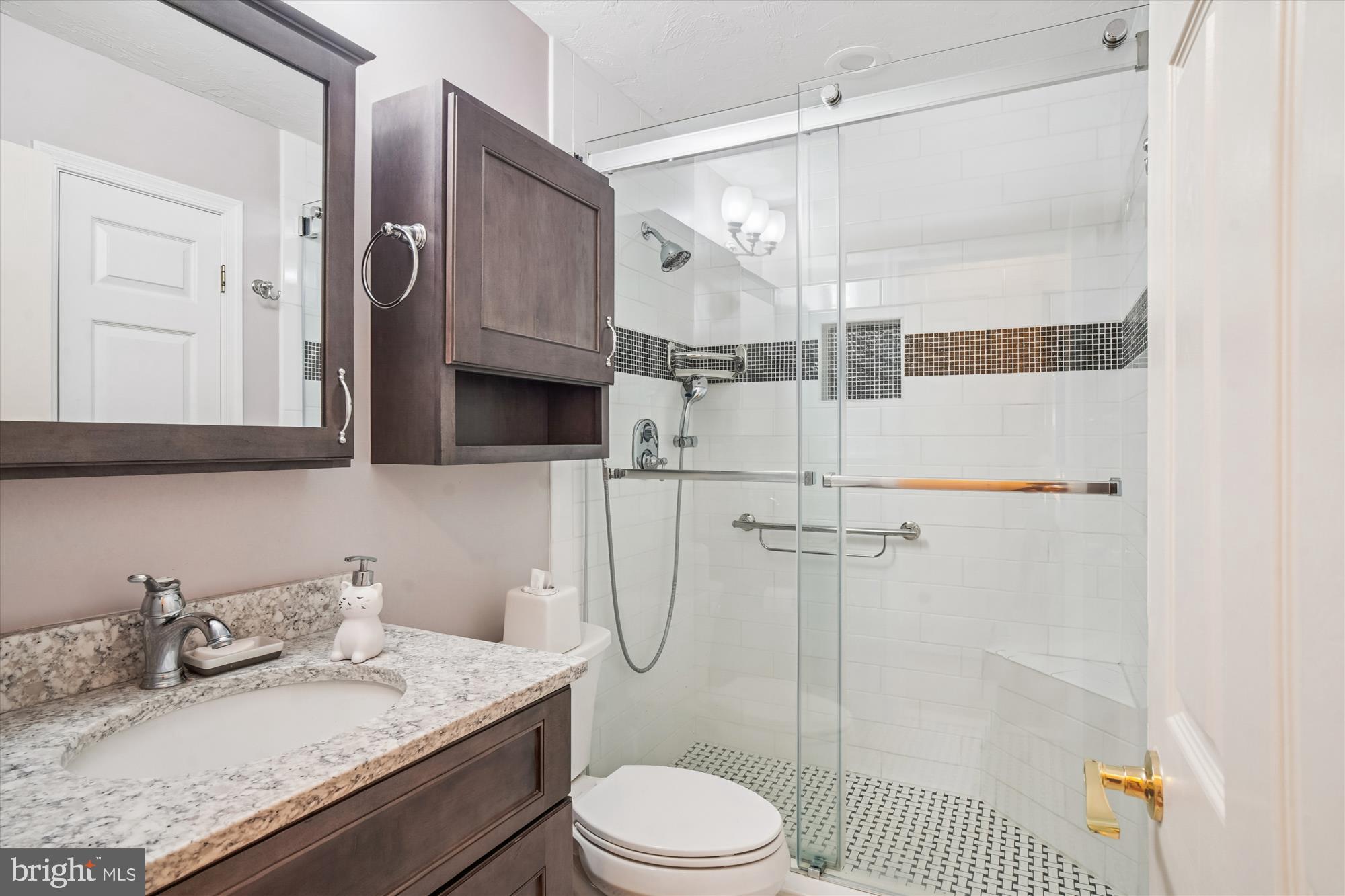 191 Marion Road Westminster, MD 21157 - Photo 14 of 38 a bathroom with a granite countertop sink toilet and shower