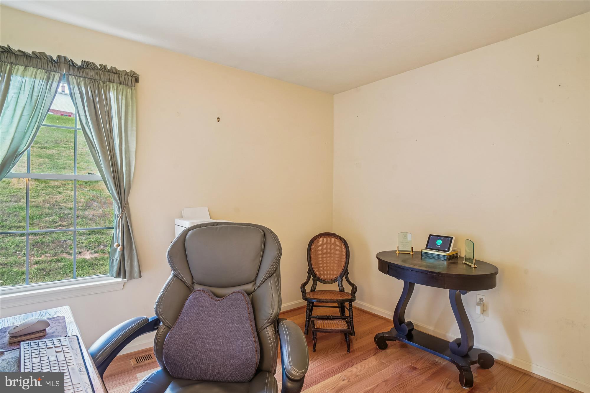 191 Marion Road Westminster, MD 21157 - Photo 16 of 38 a view of a workspace room with furniture and a window