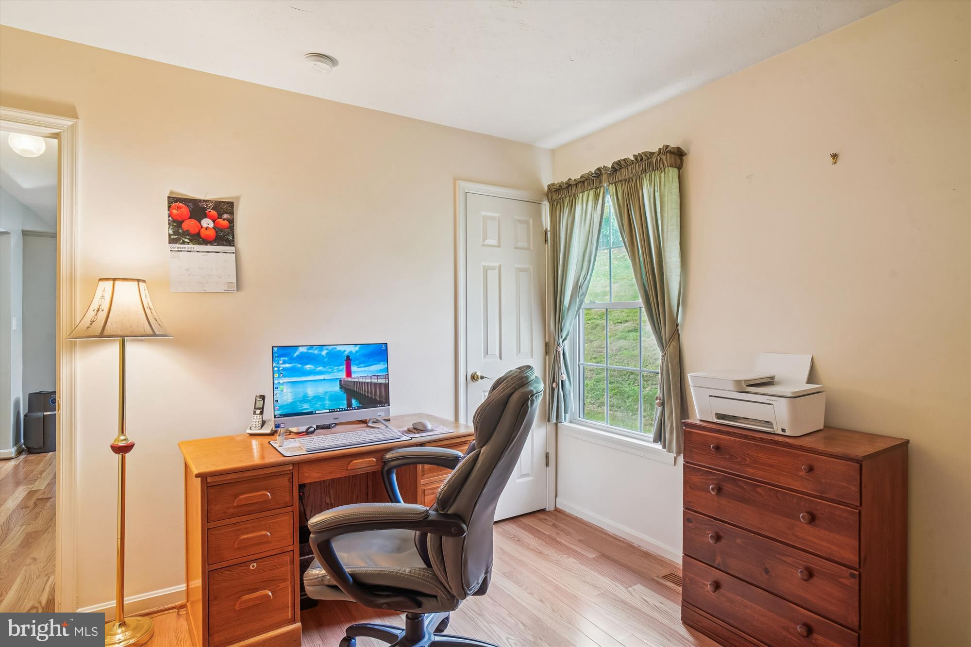 191 Marion Road Westminster, MD 21157 - Photo 17 of 38 a view of a workspace with furniture and a window