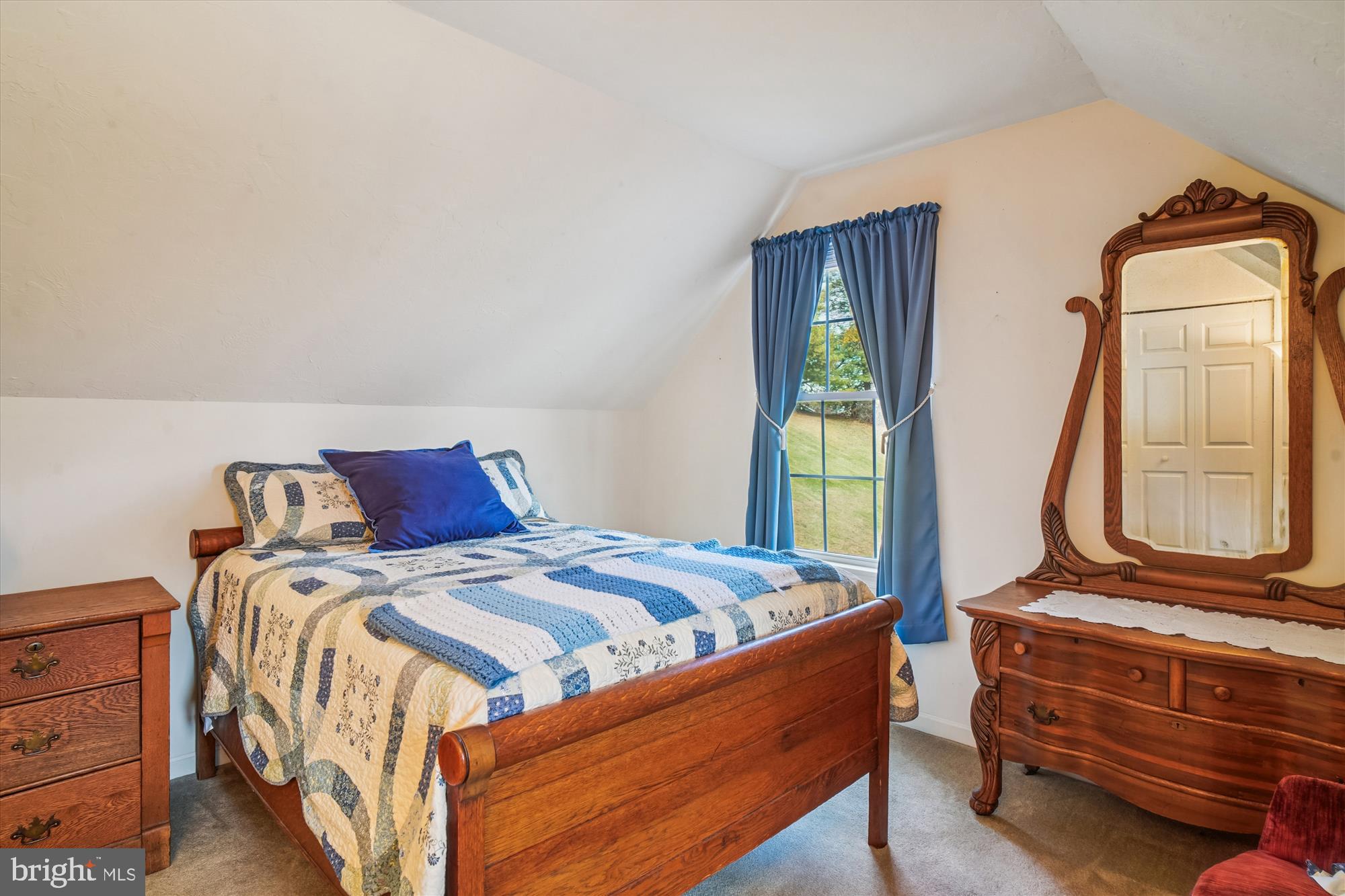 191 Marion Road Westminster, MD 21157 - Photo 25 of 38 a bed sitting in a bedroom next to a window