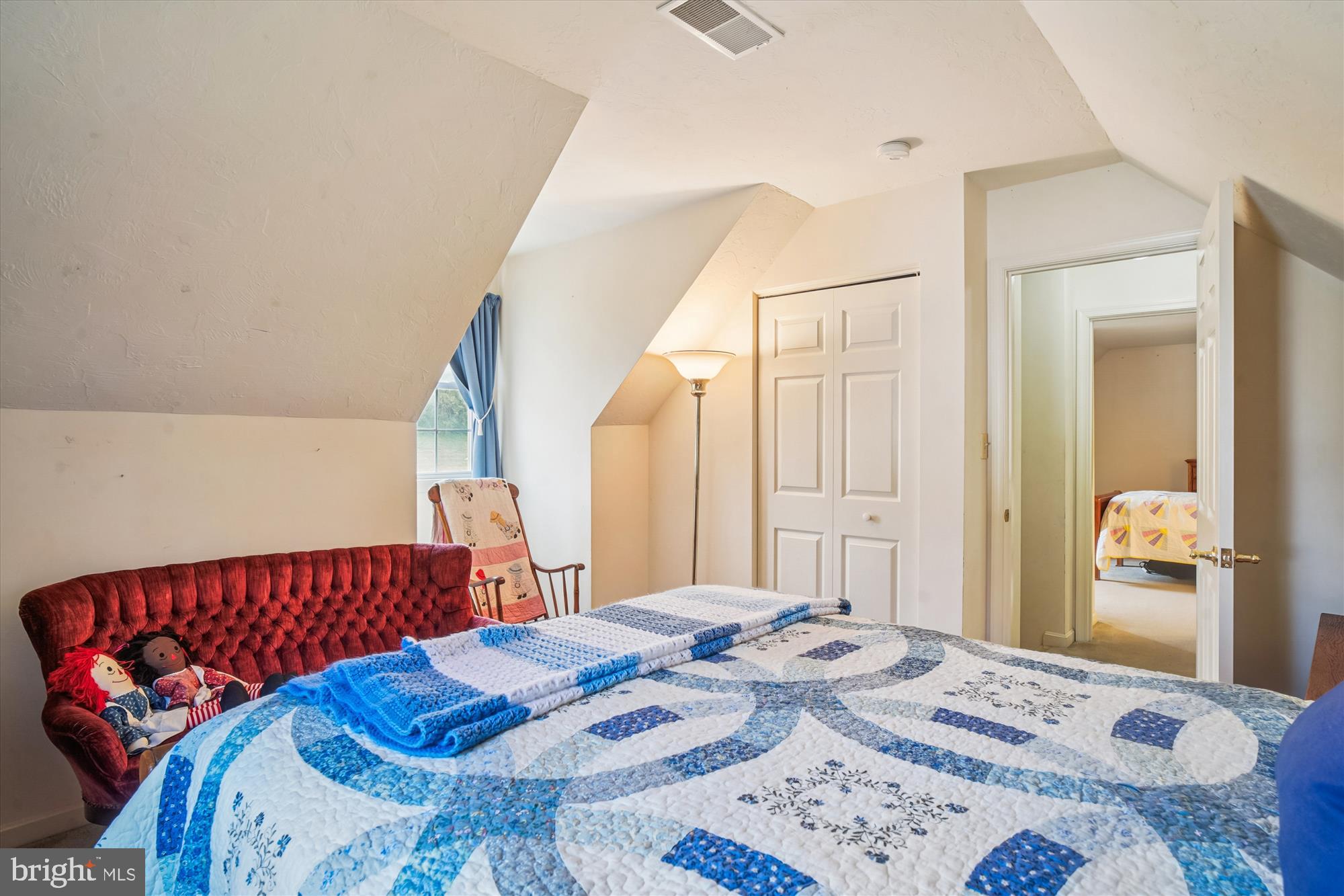 191 Marion Road Westminster, MD 21157 - Photo 26 of 38 a bedroom with a bed and a mirror