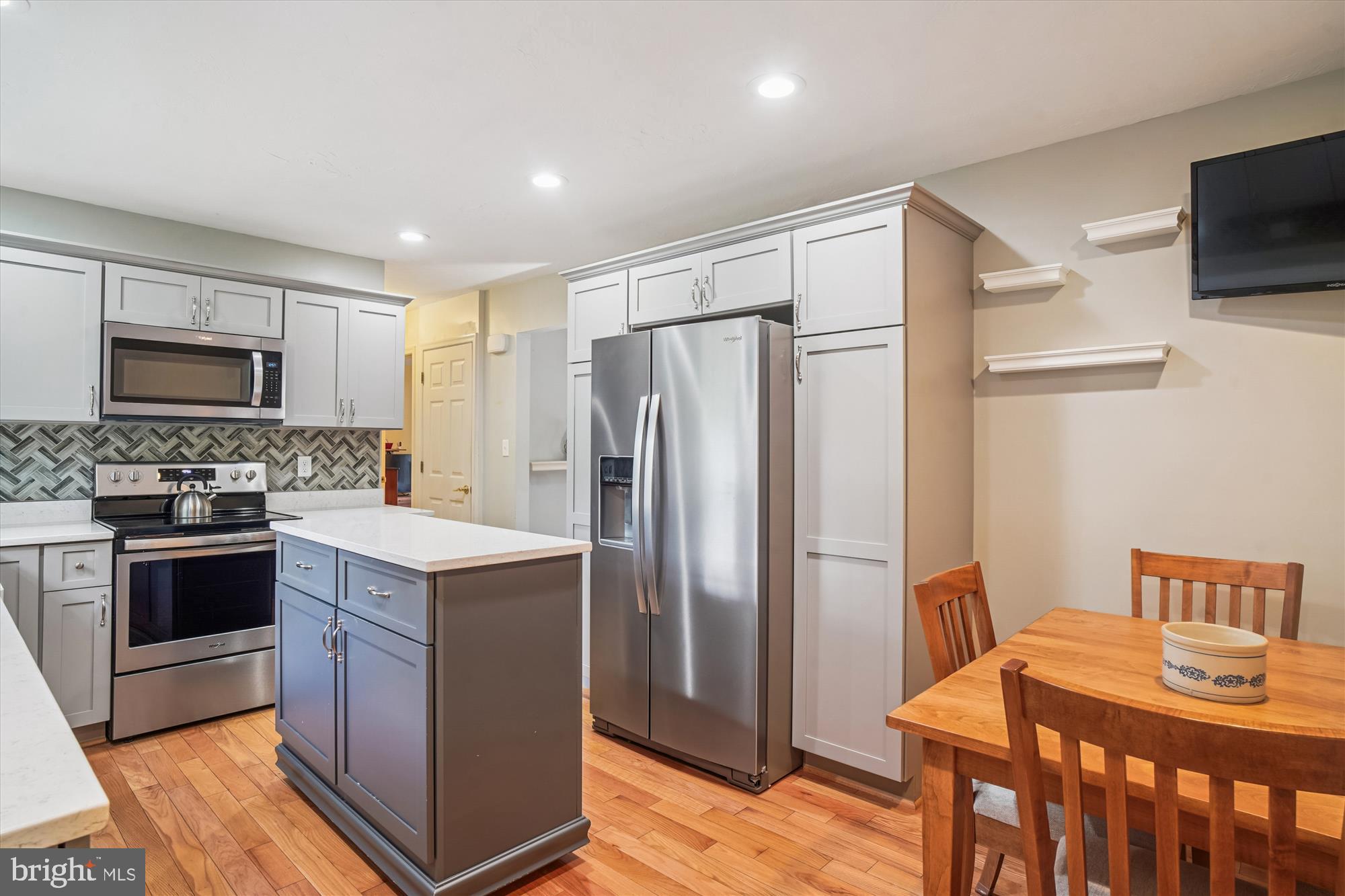 191 Marion Road Westminster, MD 21157 - Photo 8 of 38 a kitchen with stainless steel appliances granite countertop a refrigerator and a stove top oven