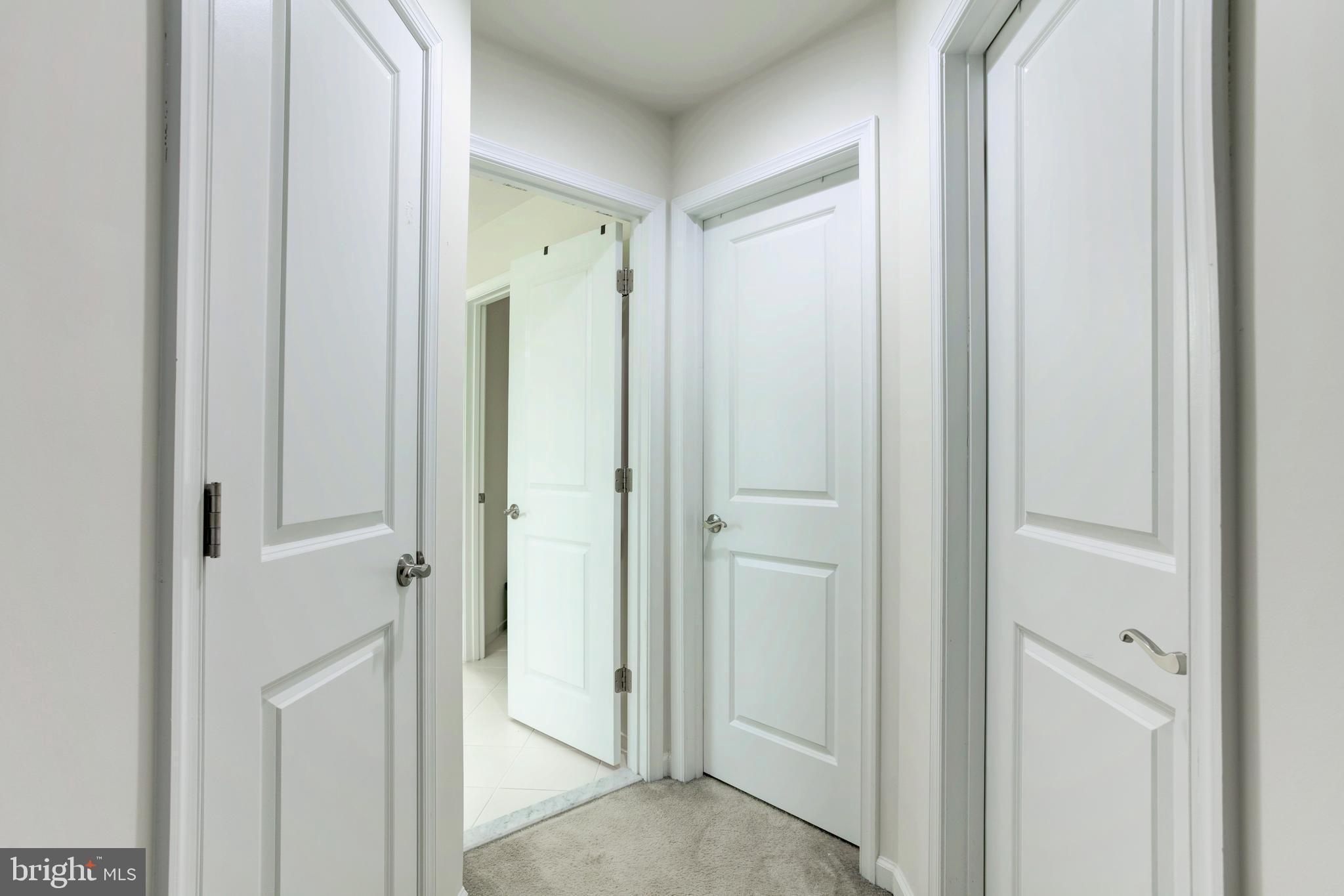 22800 Bubbling Brook Drive Brambleton, VA 20148 - Photo 33 of 64 a view of a bathroom with a glass door