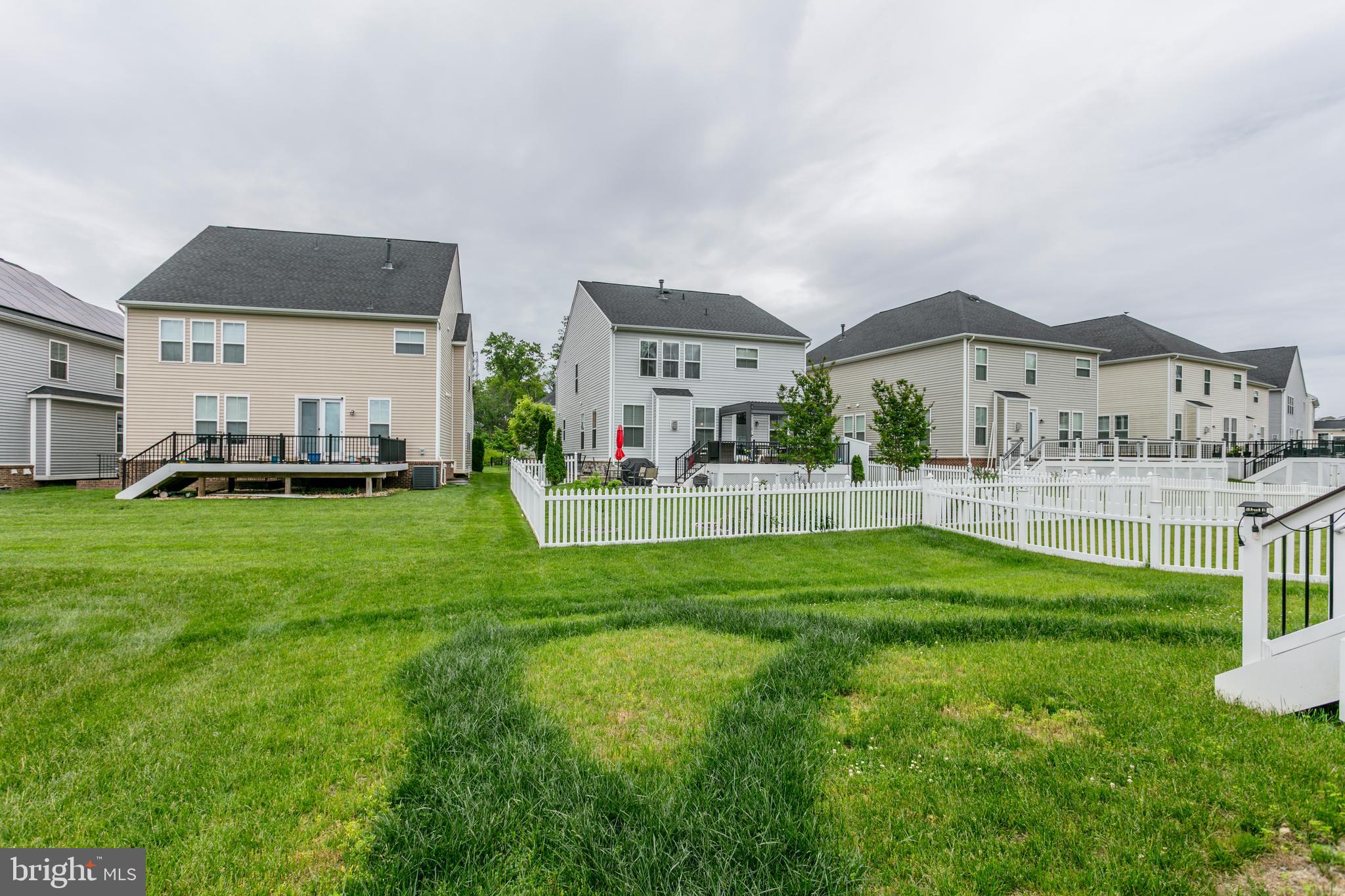 22800 Bubbling Brook Drive Brambleton, VA 20148 - Photo 59 of 64 a house view with a garden space