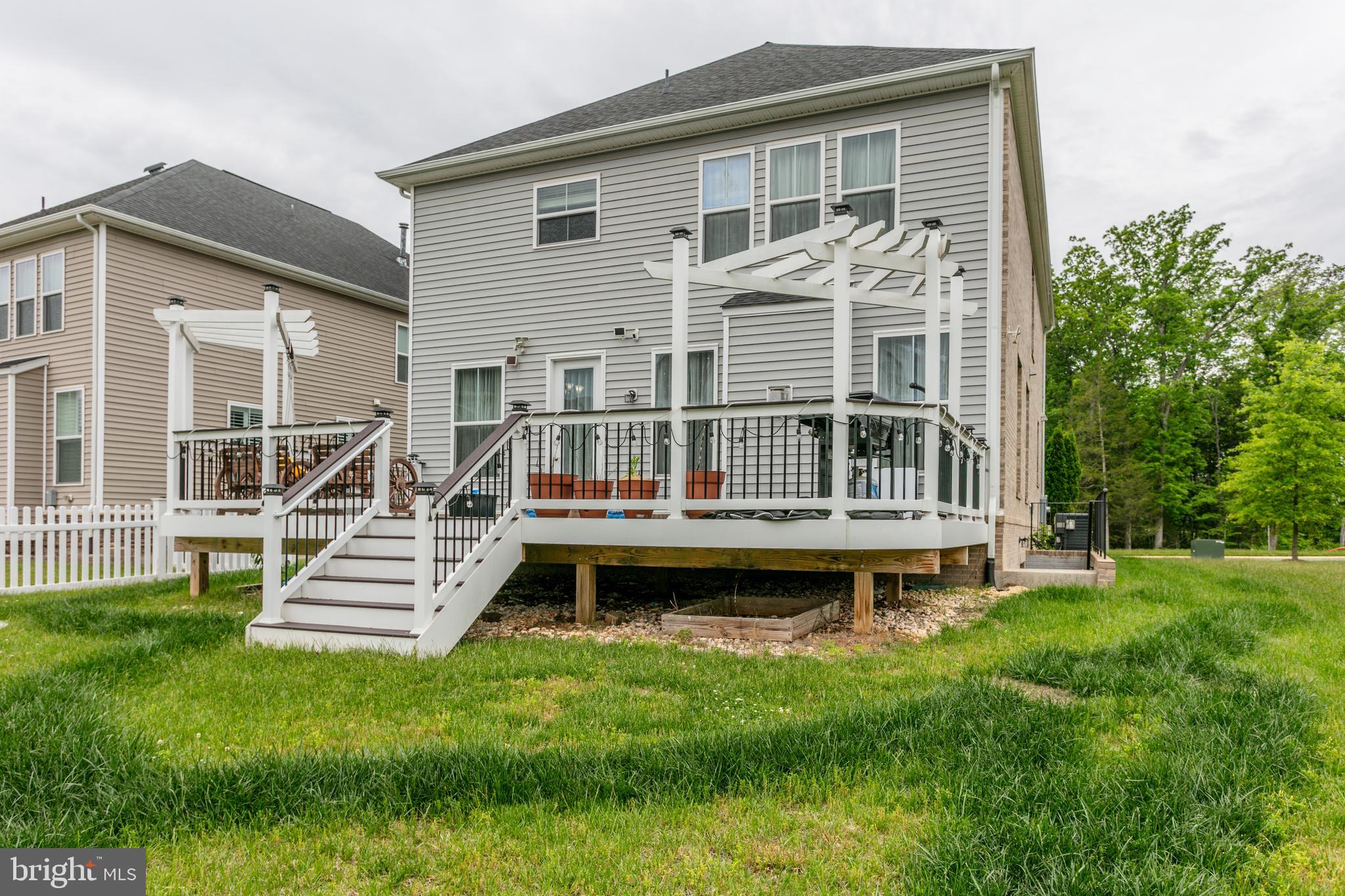 22800 Bubbling Brook Drive Brambleton, VA 20148 - Photo 64 of 64 front view of a house with a yard