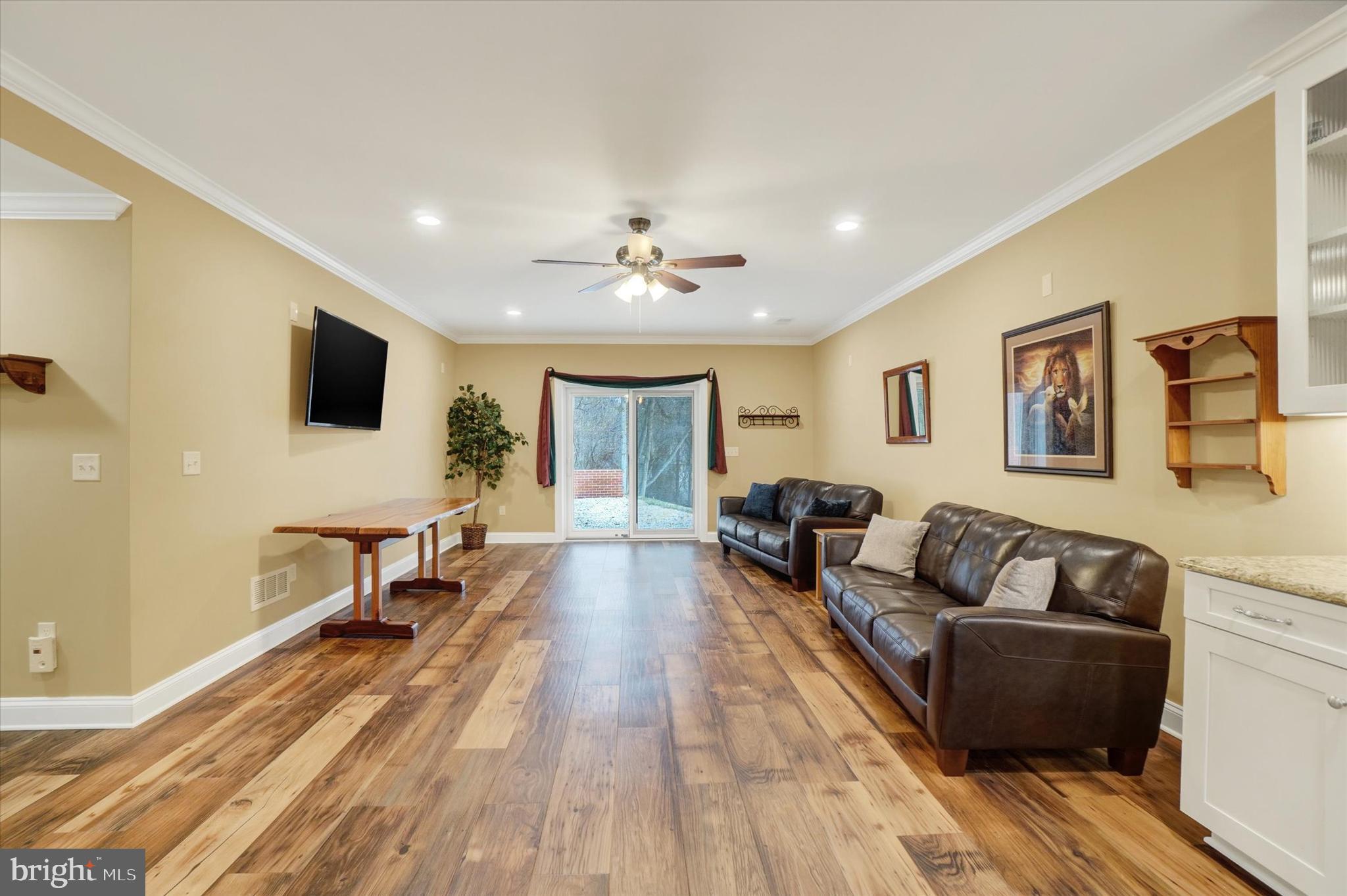 3833 Pleasant Valley Road York, PA 17406 - Photo 34 of 66 LL family room with corner fireplace & walk-out