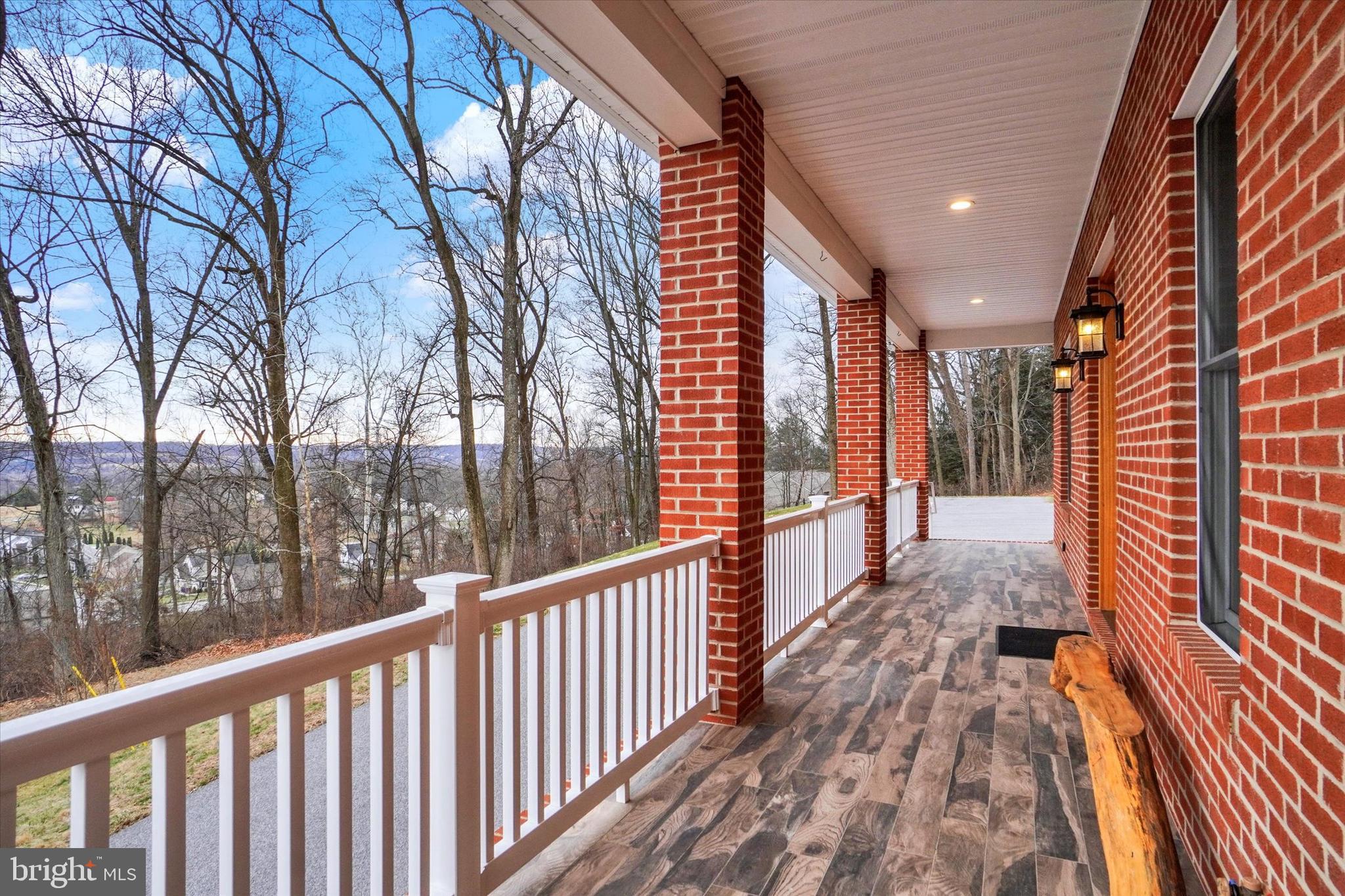3833 Pleasant Valley Road York, PA 17406 - Photo 5 of 66 Tiled front porch offering a polished entry