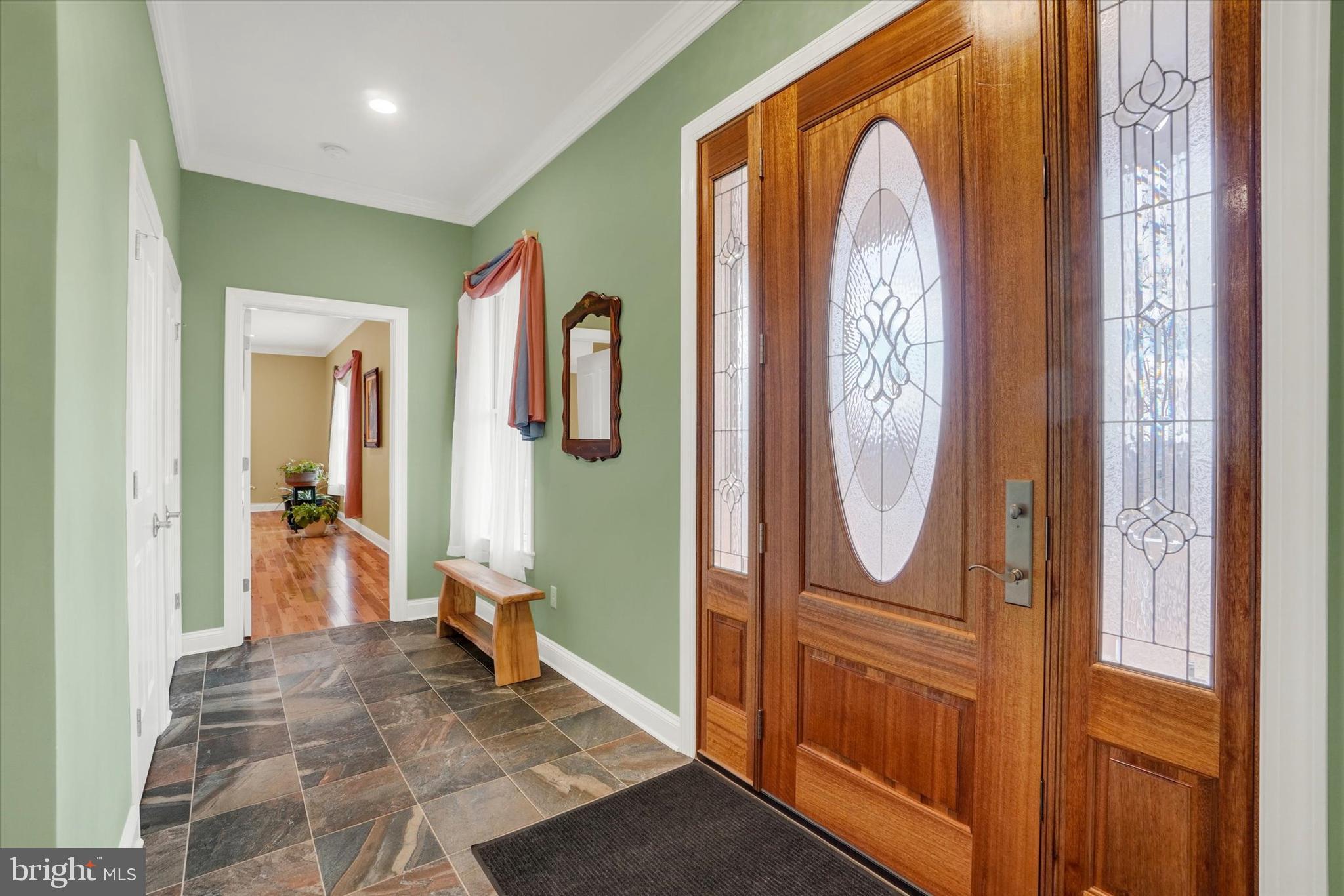 3833 Pleasant Valley Road York, PA 17406 - Photo 7 of 66 Solid Mahogany Door with tile floor entry