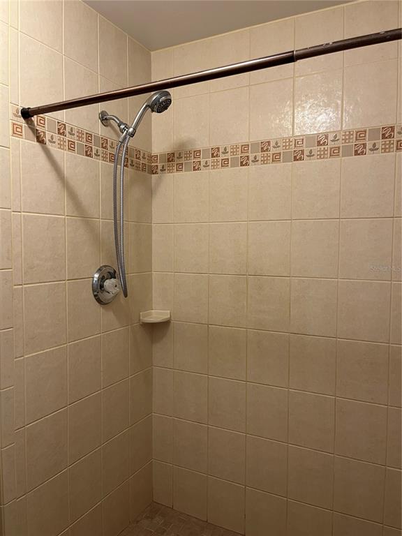 3160 Highlands Boulevard, Unit 3160 Palm Harbor, FL 34684 - Photo 14 of 40 a bathroom with a shower and a shower