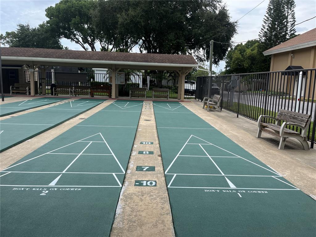 3160 Highlands Boulevard, Unit 3160 Palm Harbor, FL 34684 - Photo 30 of 40 a view of a tennis court