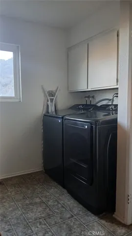 a stove top oven sitting inside of a kitchen