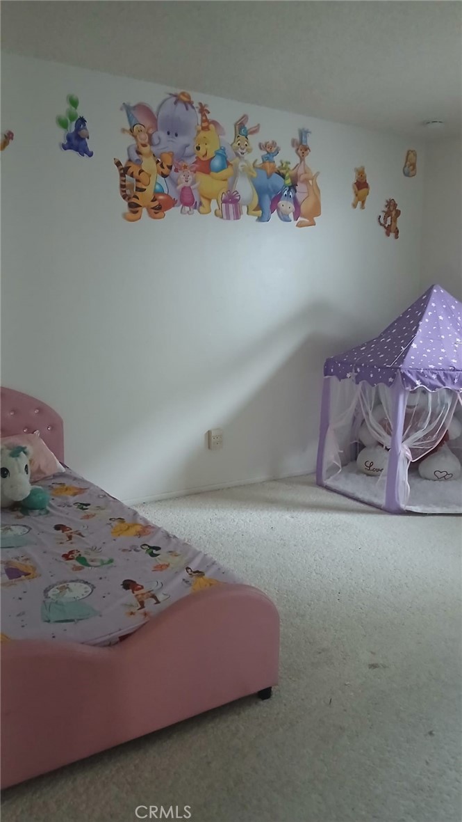 3402 California Frazier Park, CA 93225 - Photo 6 of 9 a bedroom with a bed and wall painting on the wall
