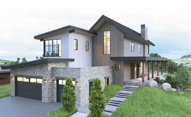 a front view of a house with garden