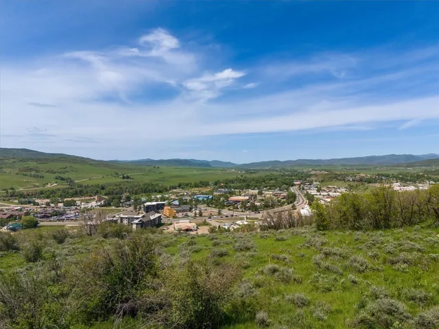 a view of residential houses with outdoor space