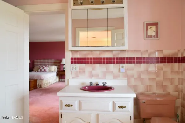 a picture of a bathroom with a sink