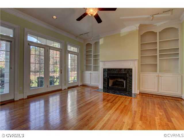 14131 River Road Chesterfield, VA 23838 - Photo 5 of 24 a view of an empty room with wooden floor and a window