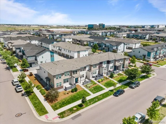 an aerial view of a house with a garden