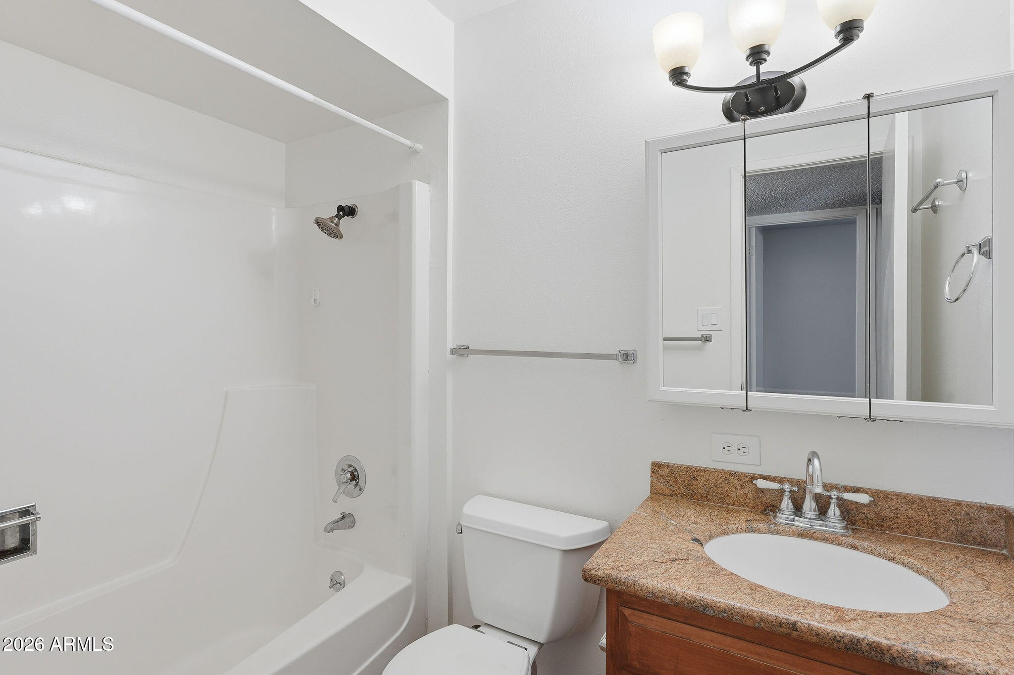 2302 East Nisbet Road Phoenix, AZ 85022 - Photo 13 of 22 a bathroom with a granite countertop sink toilet and shower