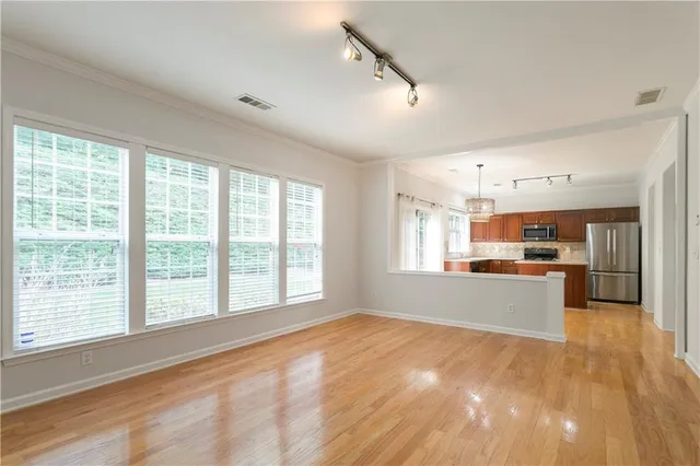 a large living room with a large window