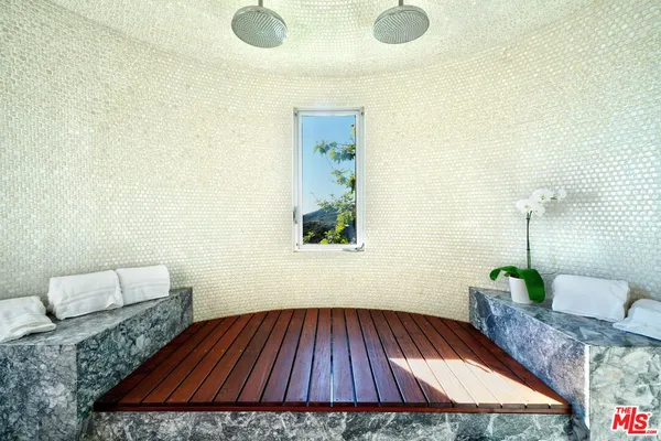 a view of kitchen with furniture and wooden floor