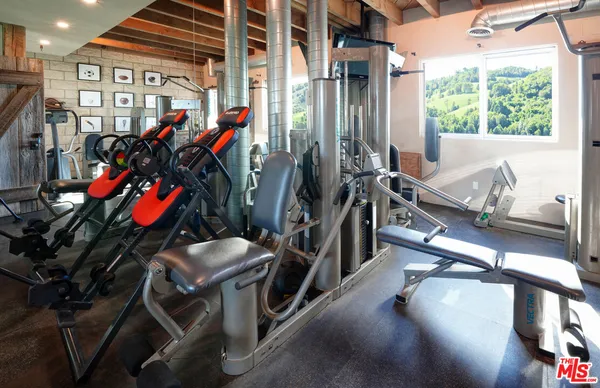 a view of a room with gym equipment
