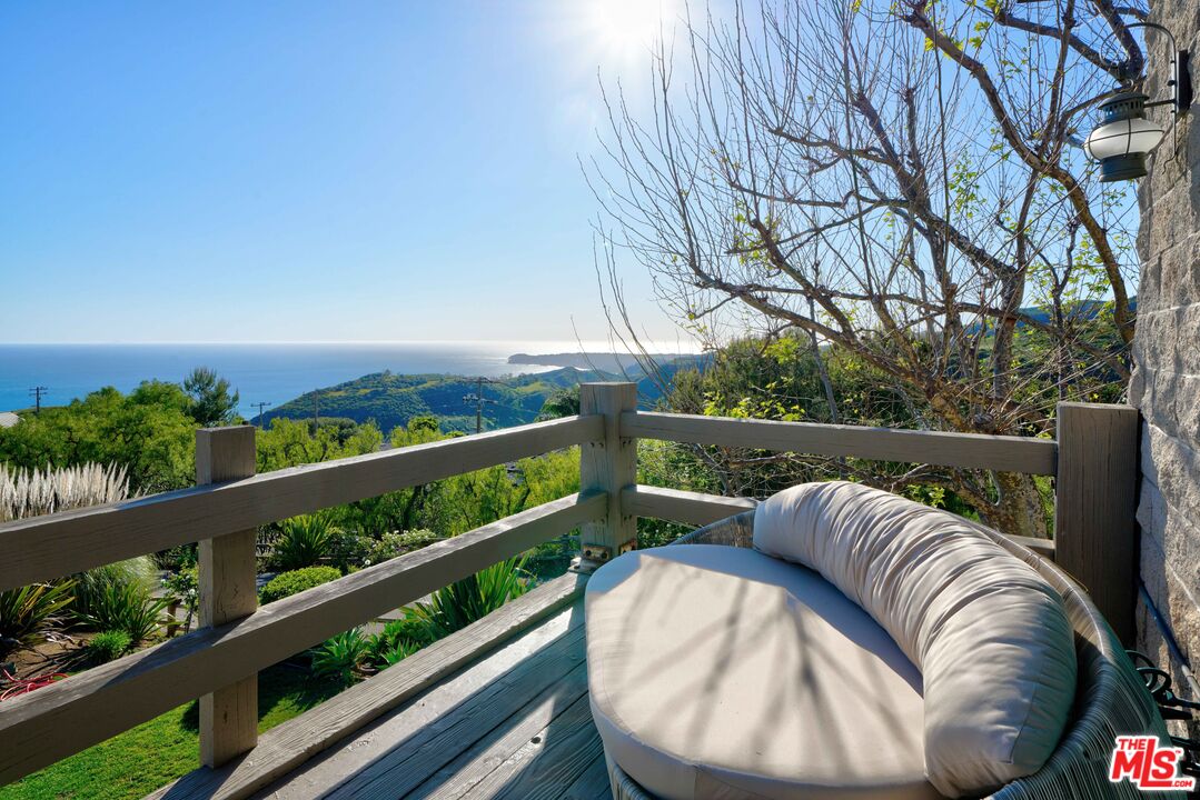 3020 Corral Canyon Road Malibu, CA 90265 - Photo 21 of 29 a balcony with wooden floor