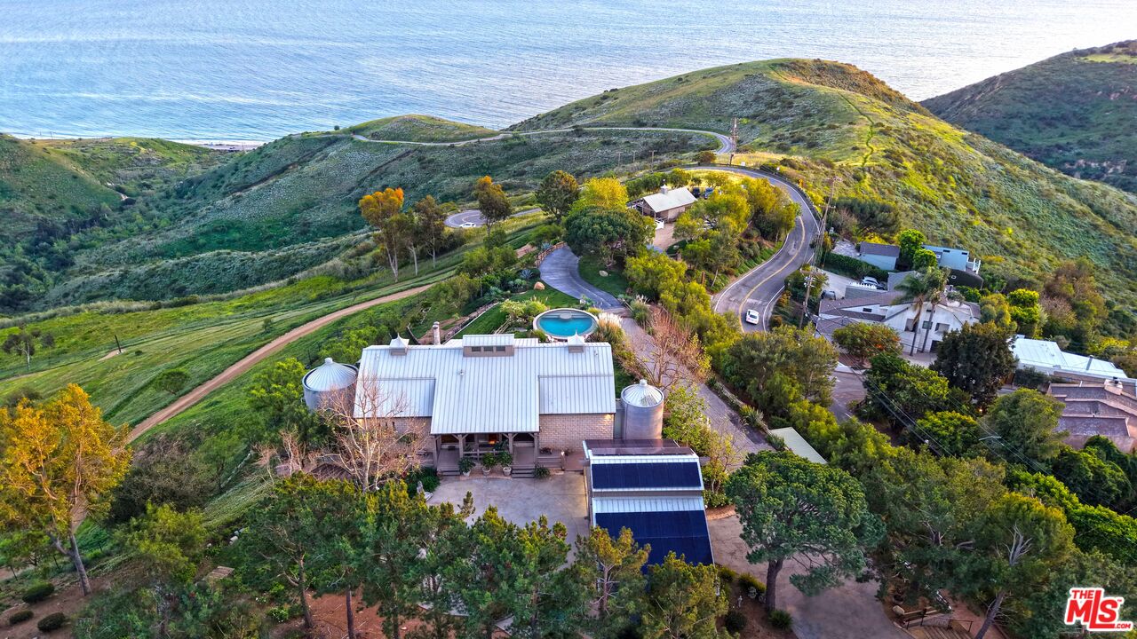 3020 Corral Canyon Road Malibu, CA 90265 - Photo 29 of 29 an aerial view of residential houses with outdoor space and pool