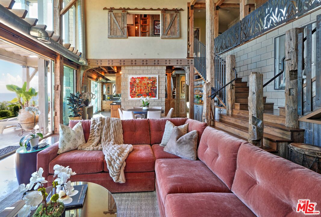 3020 Corral Canyon Road Malibu, CA 90265 - Photo 4 of 29 a outdoor living room with patio furniture and a potted plant