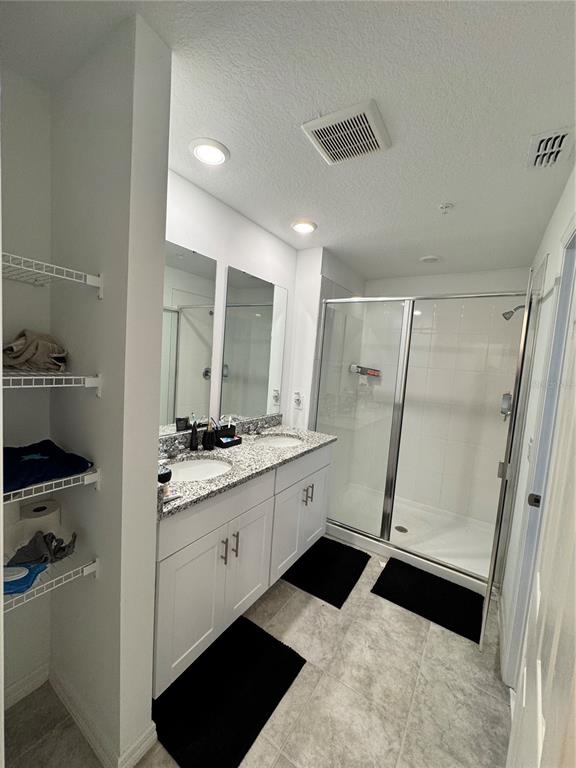 2089 Crape Jasmine Lane Orlando, FL 32824 - Photo 19 of 22 a kitchen with a sink and a refrigerator